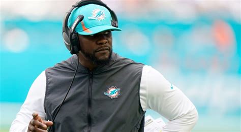 dolphins head coach fired.